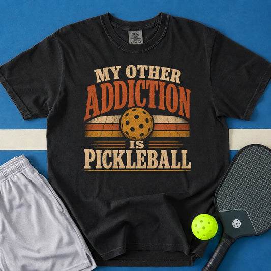 May include Pickleball Addiction T-Shirt in black t-shirt with Pickleball Addiction design