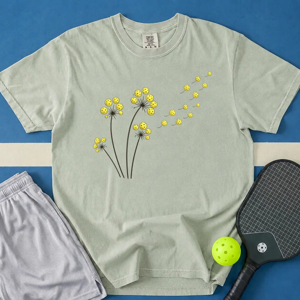 May include Pickleball Dandelions T-Shirt in bay t-shirt with Pickleball Dandelions design