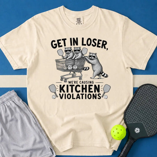 May include We're Causing Kitchen Violations T-Shirt in ivory t-shirt with We're Causing Kitchen Violations design