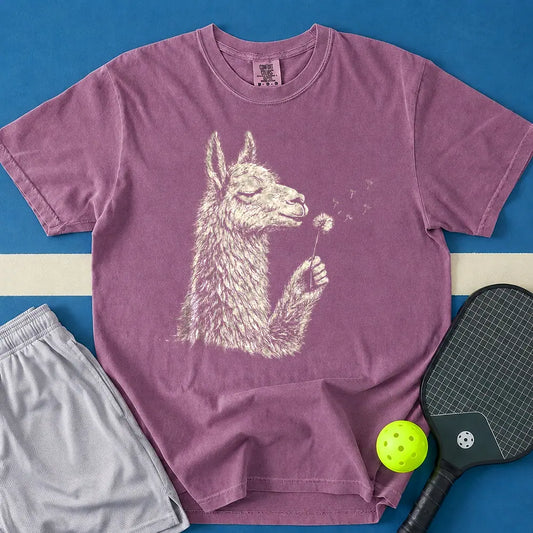 May include Llama Blowing Wishes T-Shirt in berry t-shirt with Llama Blowing Wishes design
