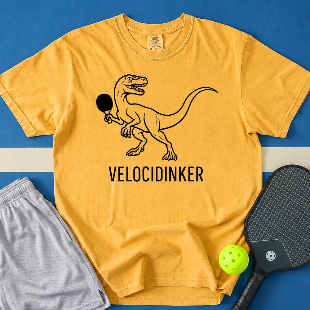 May include Velocidinker T-Shirt in mustard t-shirt with Velocidinker design