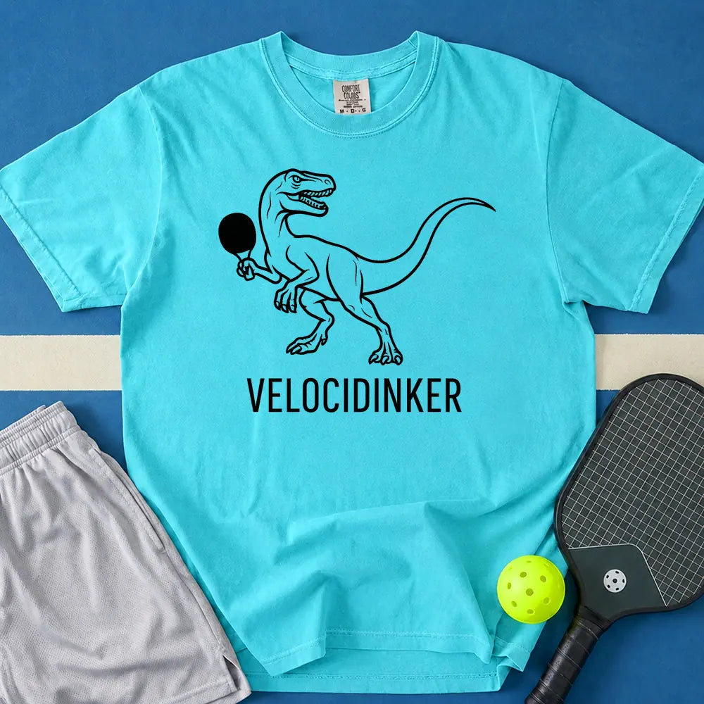 May include Velocidinker T-Shirt in lagoon t-shirt with Velocidinker design