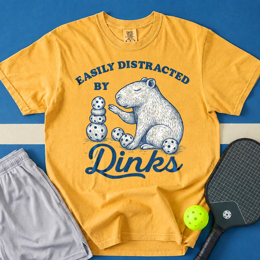 May include Easily Distracted by Balls T-Shirt in mustard t-shirt with Easily Distracted By Rocks Tee design