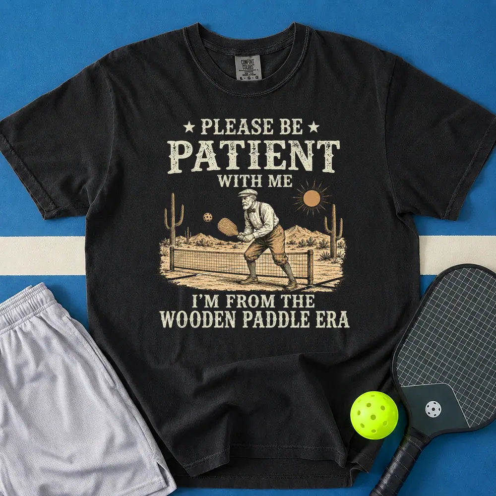 May include Be Patient With Me Wooden Paddle Era T-Shirt in black t-shirt with Be Patient With Me Wooden Paddle Era design