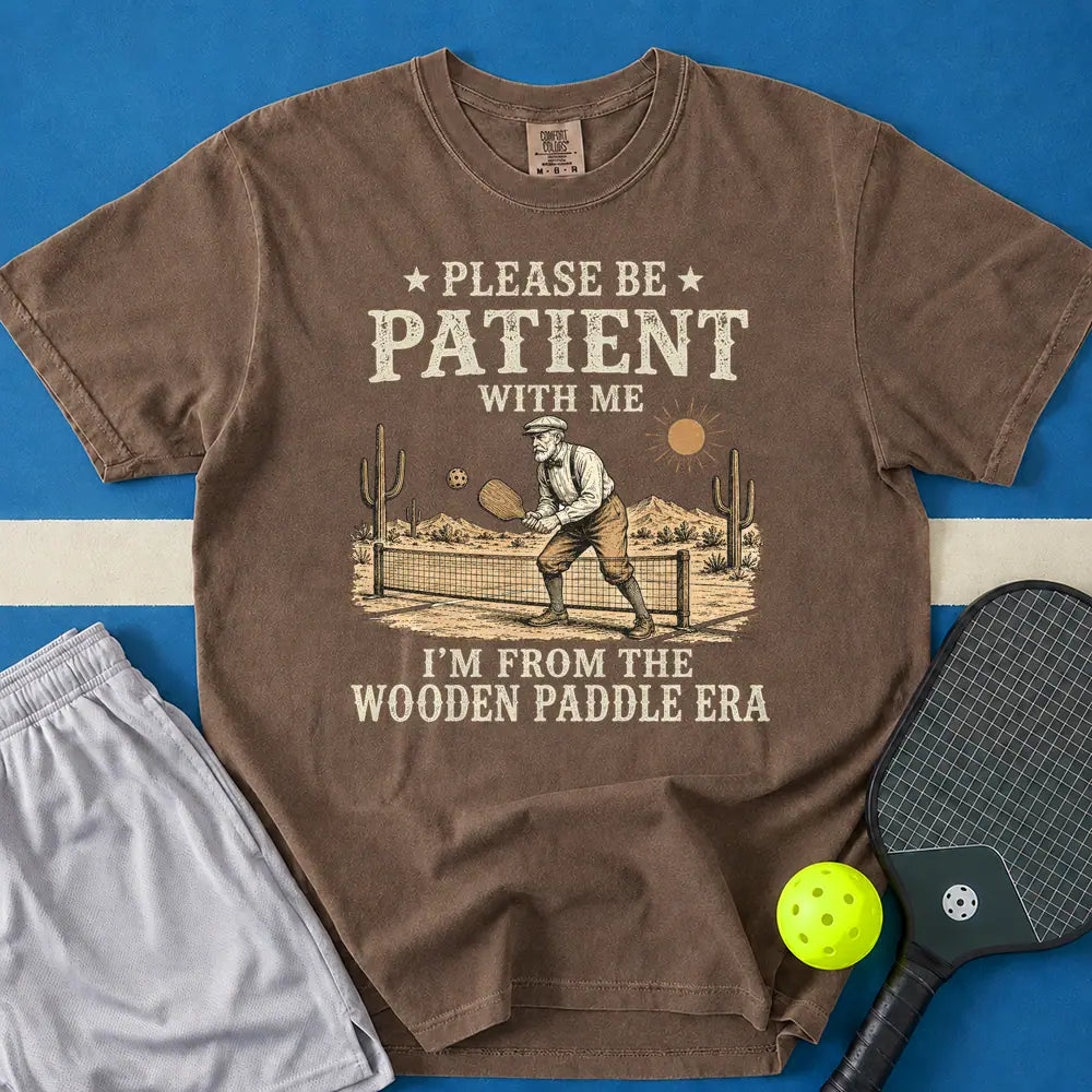 May include Be Patient With Me Wooden Paddle Era T-Shirt in espresso t-shirt with Be Patient With Me Wooden Paddle Era design