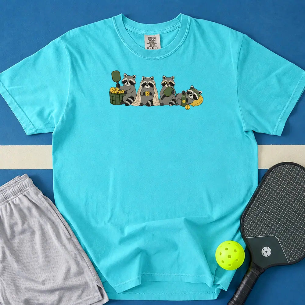 May include Cozy Player T-Shirt in lagoon t-shirt with Cozy Player design
