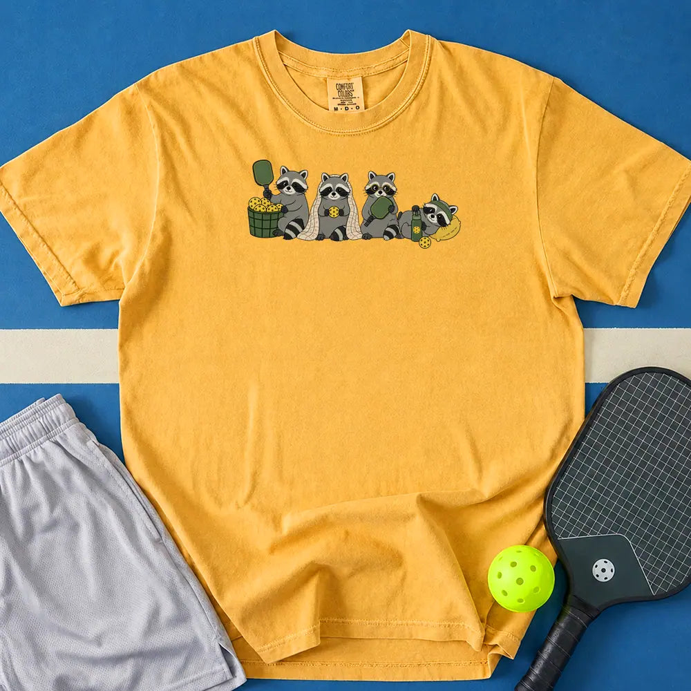 May include Cozy Player T-Shirt in mustard t-shirt with Cozy Player design