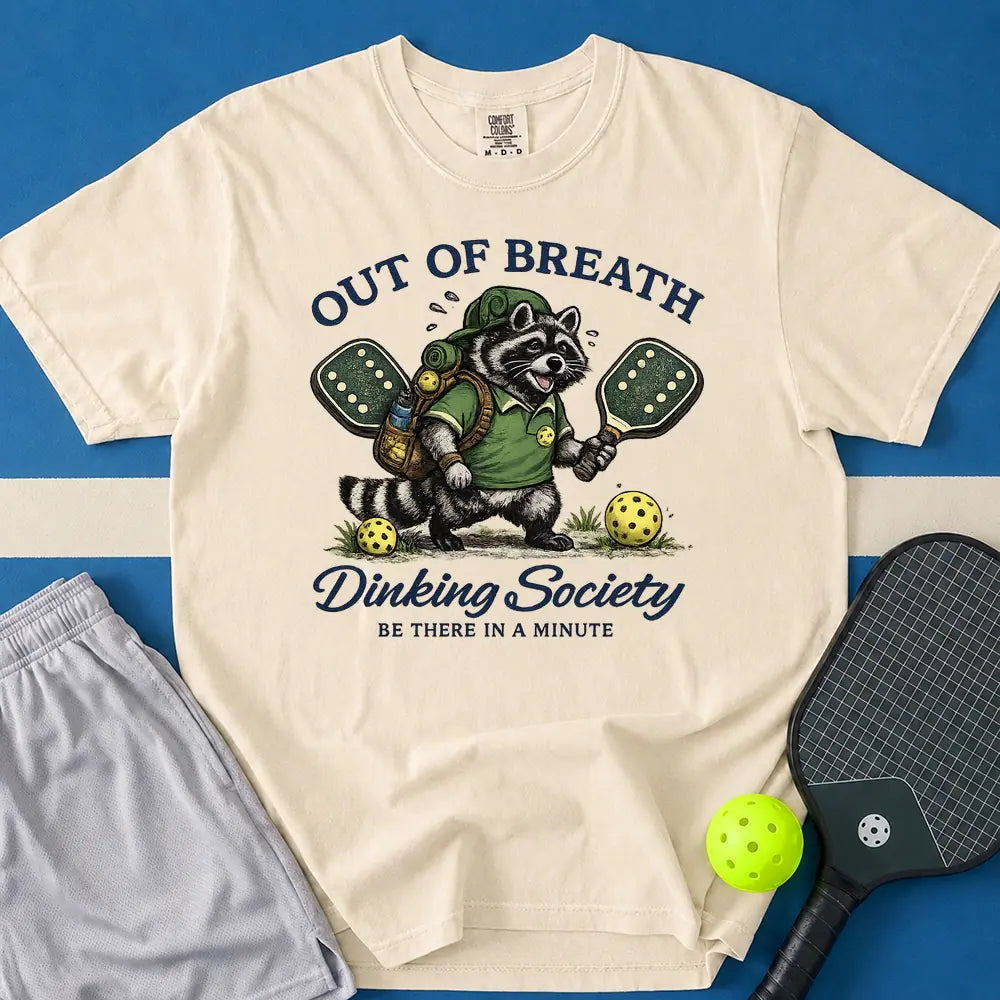 May include Dinking Society T-Shirt in ivory t-shirt with Dinking Society design