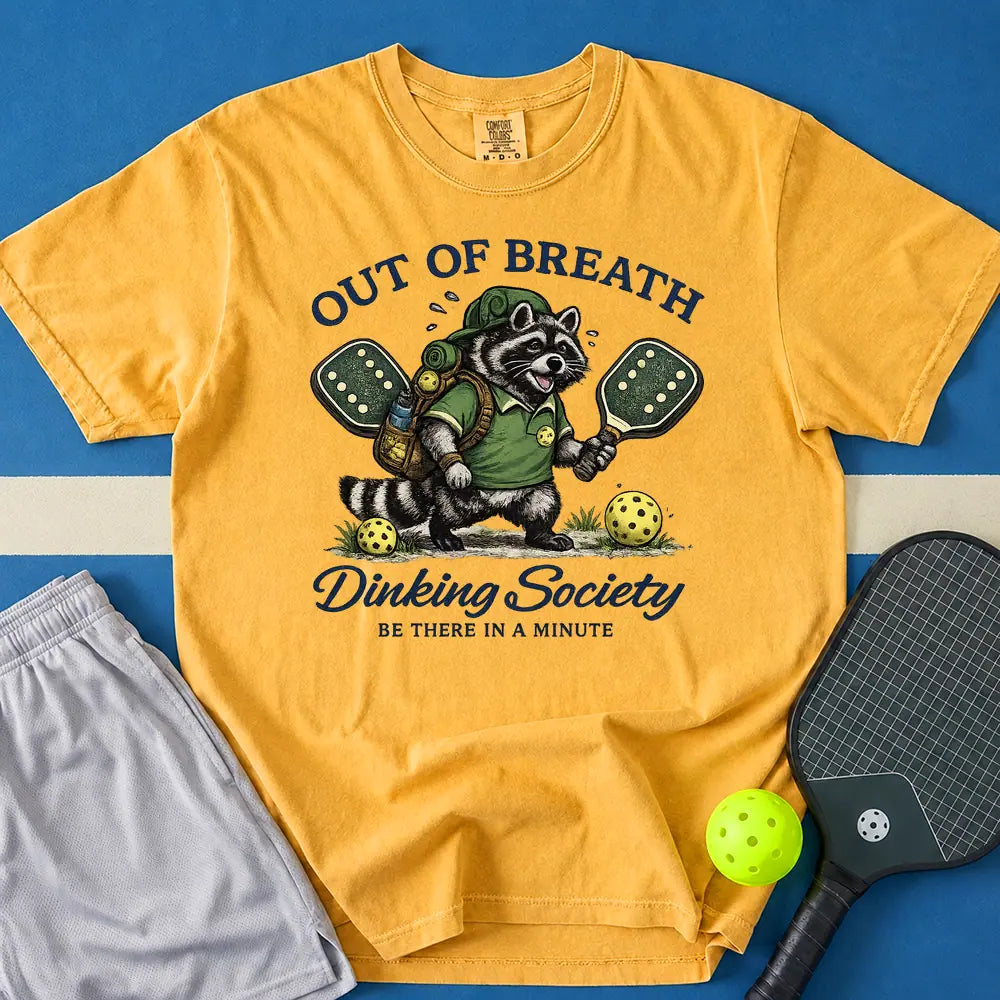 May include Dinking Society T-Shirt in mustard t-shirt with Dinking Society design