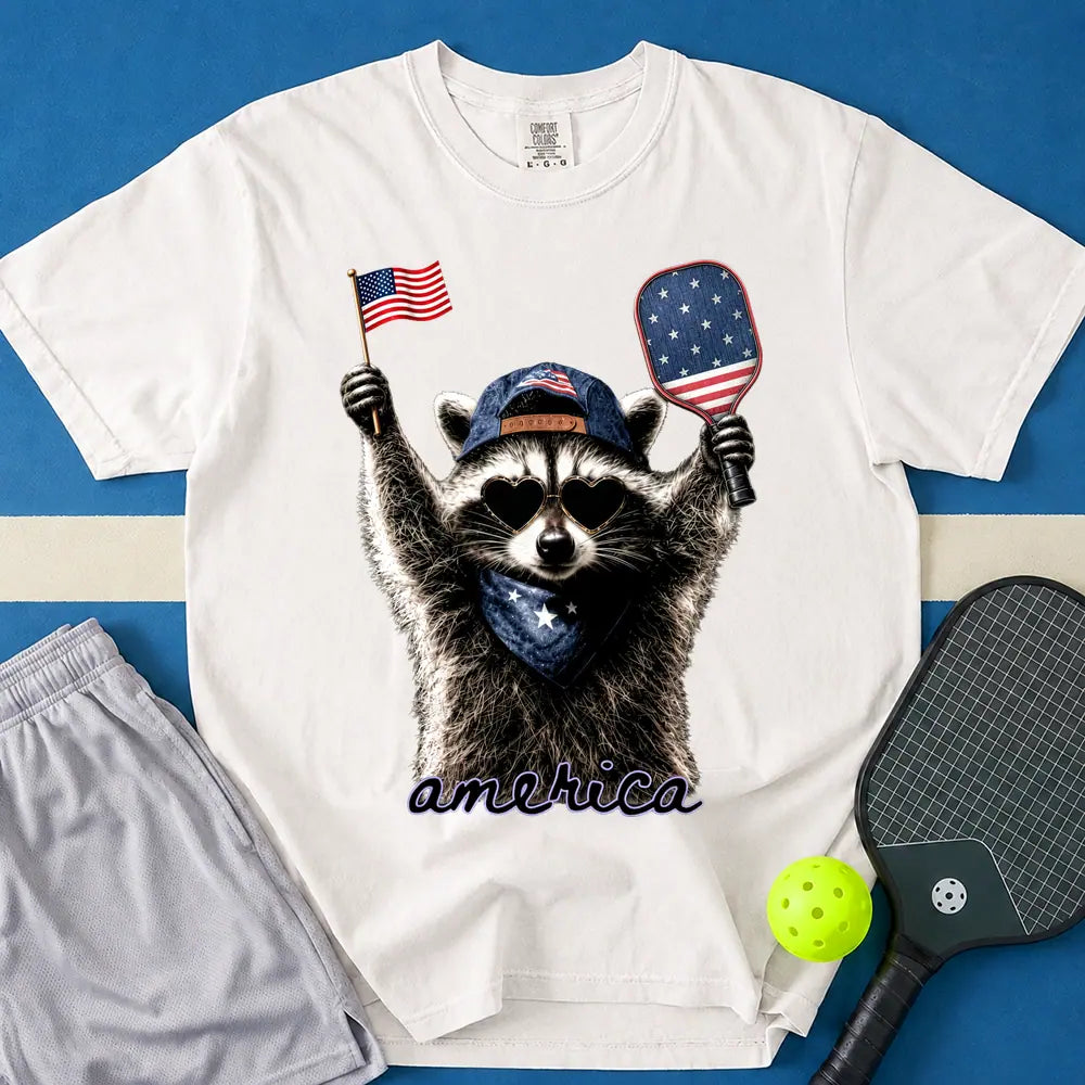 May include Feral & Pickleball T-Shirt in white t-shirt with Feral & Free Raccoon design