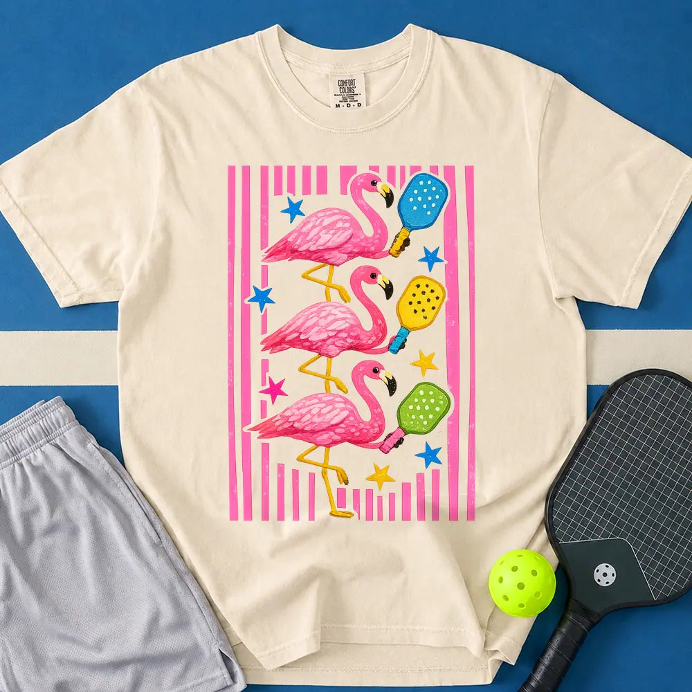 May include Flamingos Paddles T-Shirt in ivory t-shirt with Flamingos Paddles design