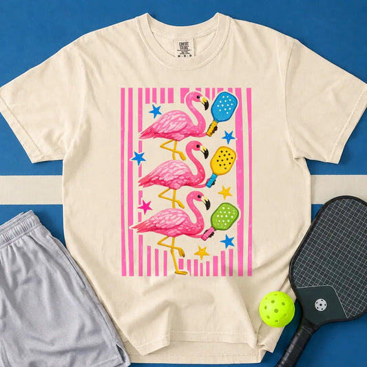 May include Flamingos Paddles T-Shirt in ivory t-shirt with Flamingos Paddles design