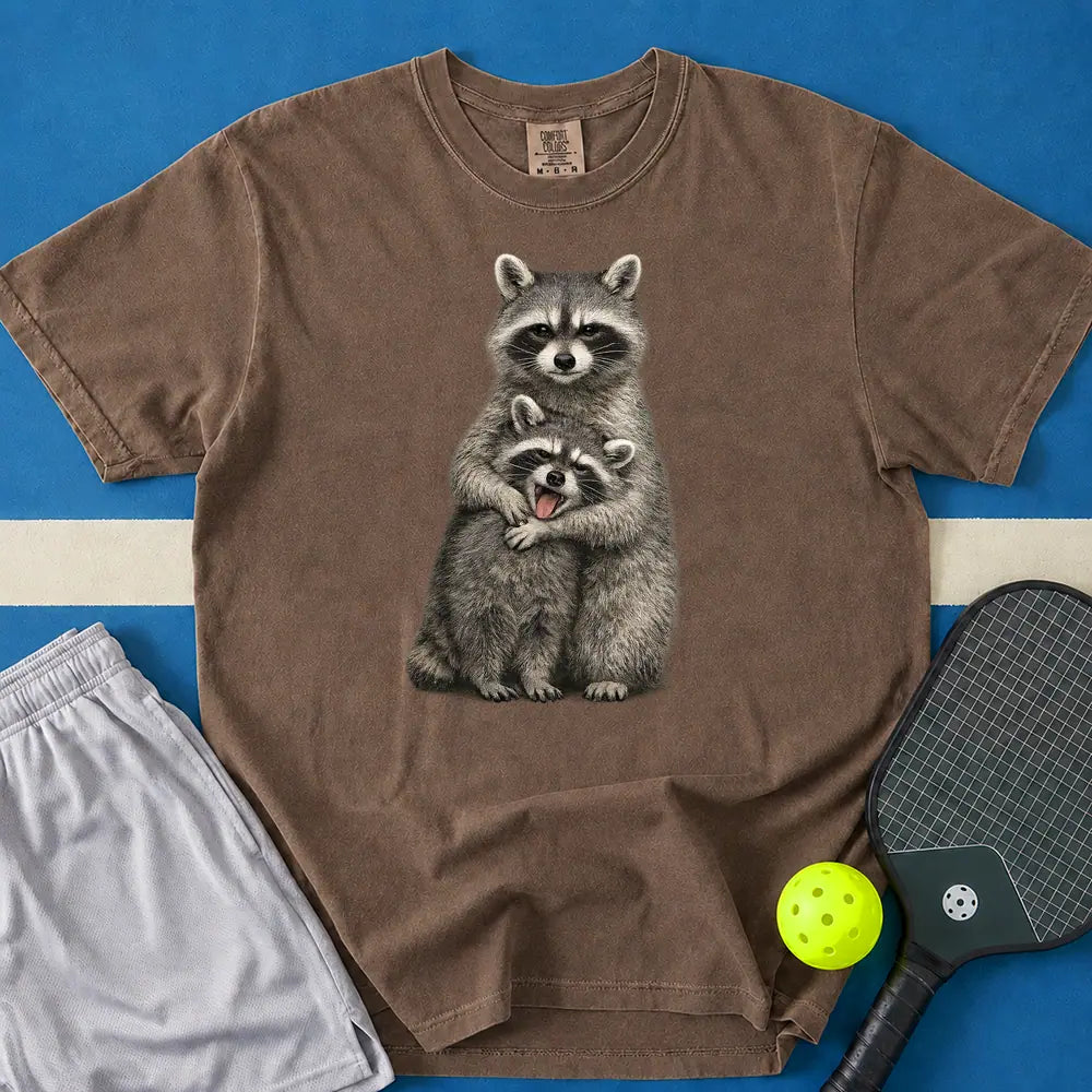 May include Hugging Raccoons T-Shirt in espresso t-shirt with Hugging Raccoons design