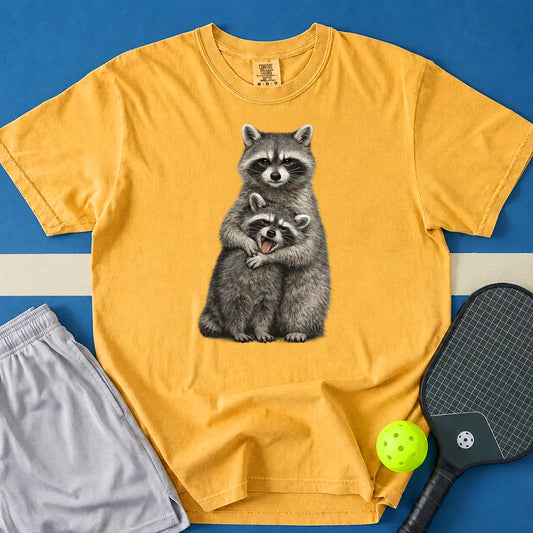 May include Hugging Raccoons T-Shirt in mustard t-shirt with Hugging Raccoons design