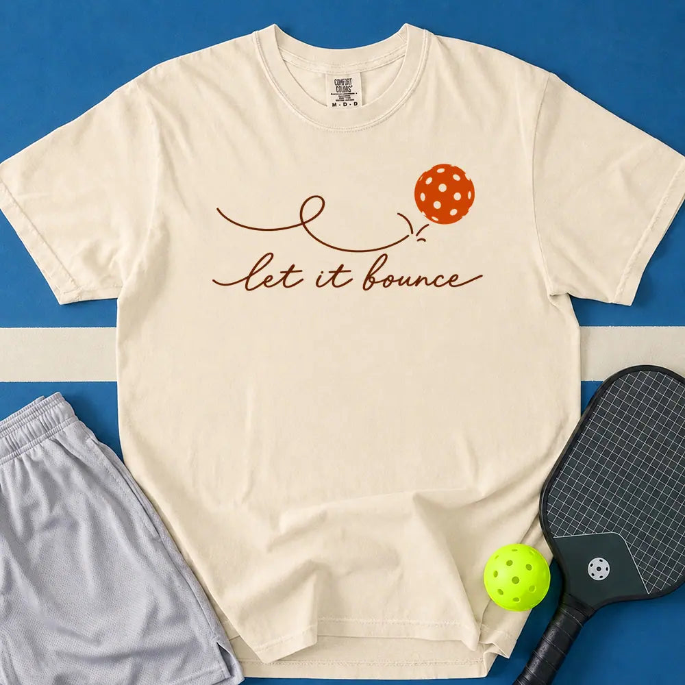 May include Let It Bounce Pickleball T-Shirt in ivory t-shirt with Let It Bounce Pickleball design