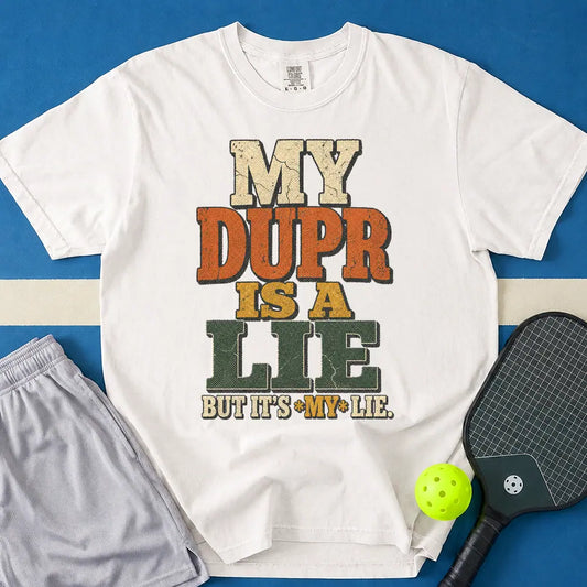 May include MY DUPR IS A LIE T-Shirt in white t-shirt with MY DUPR IS A LIE design
