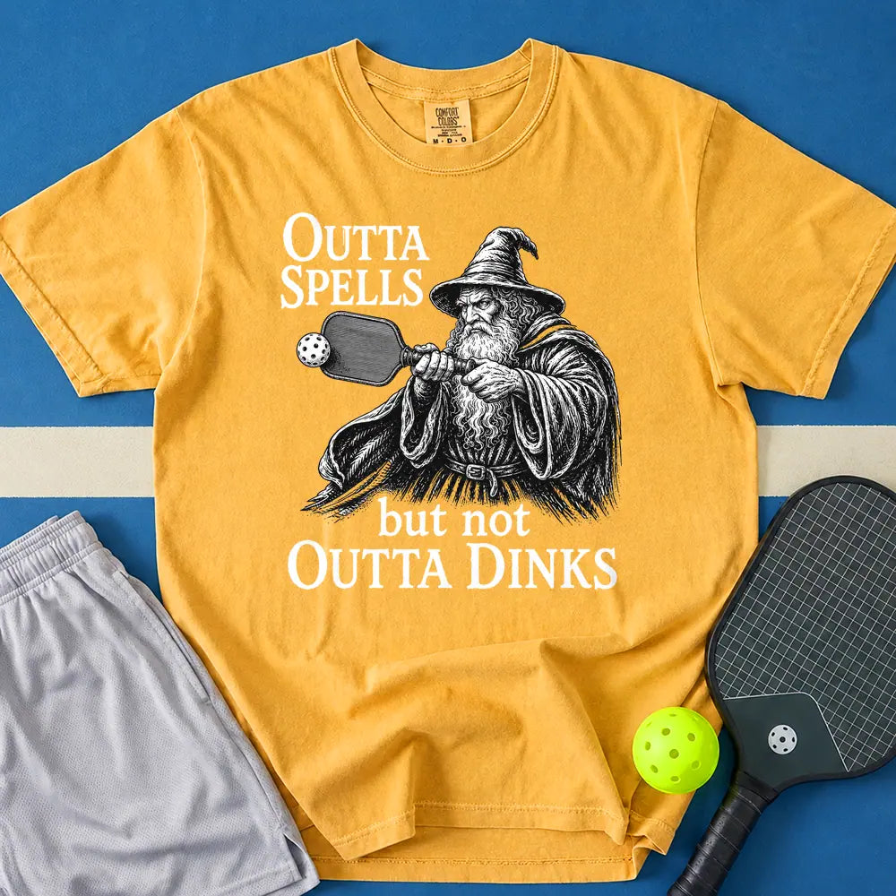 May include Outta Spells But Not Outta Dinks T-Shirt in mustard t-shirt with Outta Spells But Not Outta Dinks design
