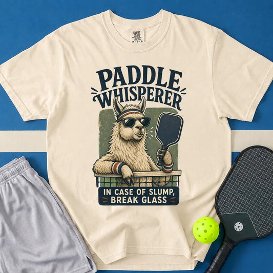 May include Paddle Whisperer T-Shirt in ivory t-shirt with Paddle Whisperer design