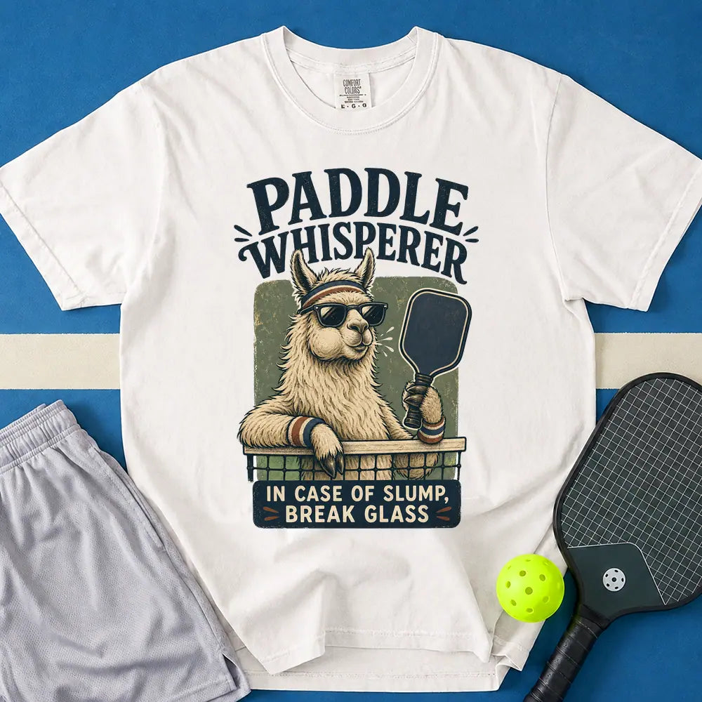May include Paddle Whisperer T-Shirt in white t-shirt with Paddle Whisperer design