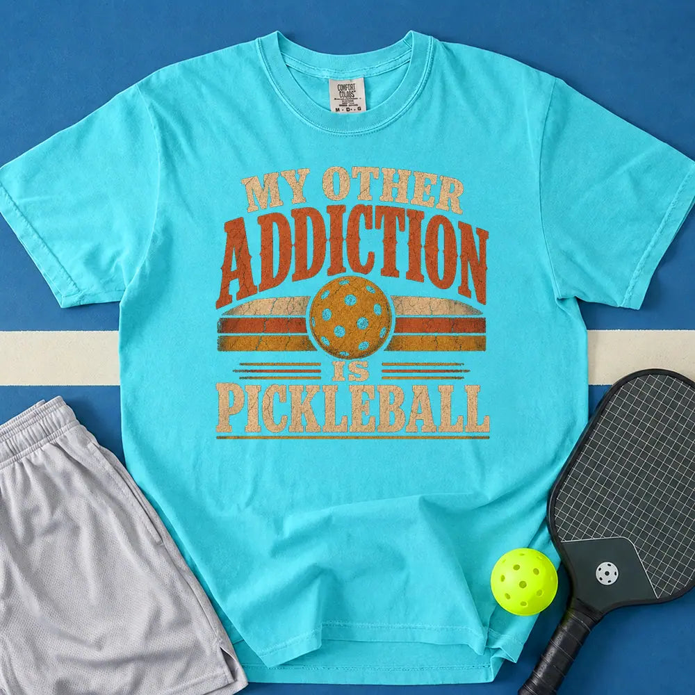 May include Pickleball Addiction T-Shirt in lagoon t-shirt with Pickleball Addiction design