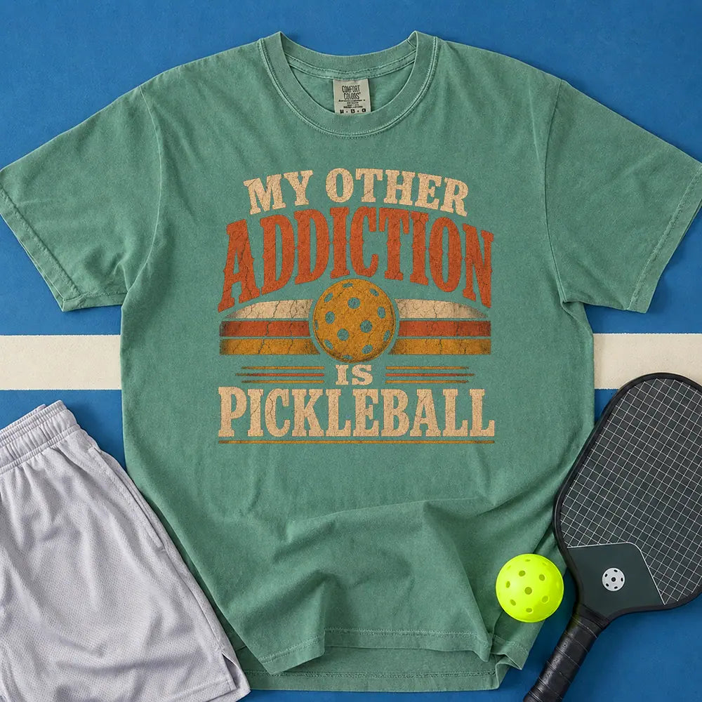 May include Pickleball Addiction T-Shirt in light green t-shirt with Pickleball Addiction design