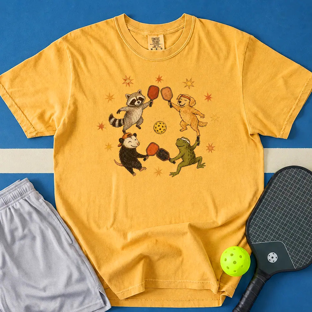 May include Playing Together T-Shirt in mustard t-shirt with Playing Together design