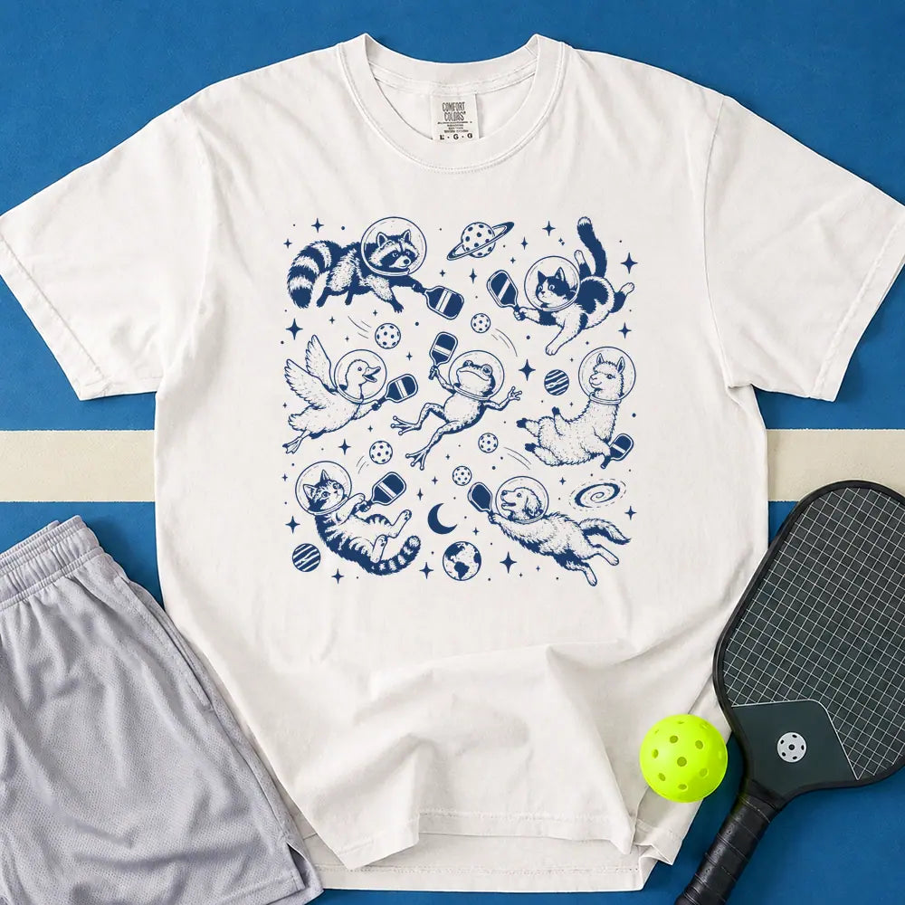 May include Space Pickleball T-Shirt in white t-shirt with Space Pickleball design