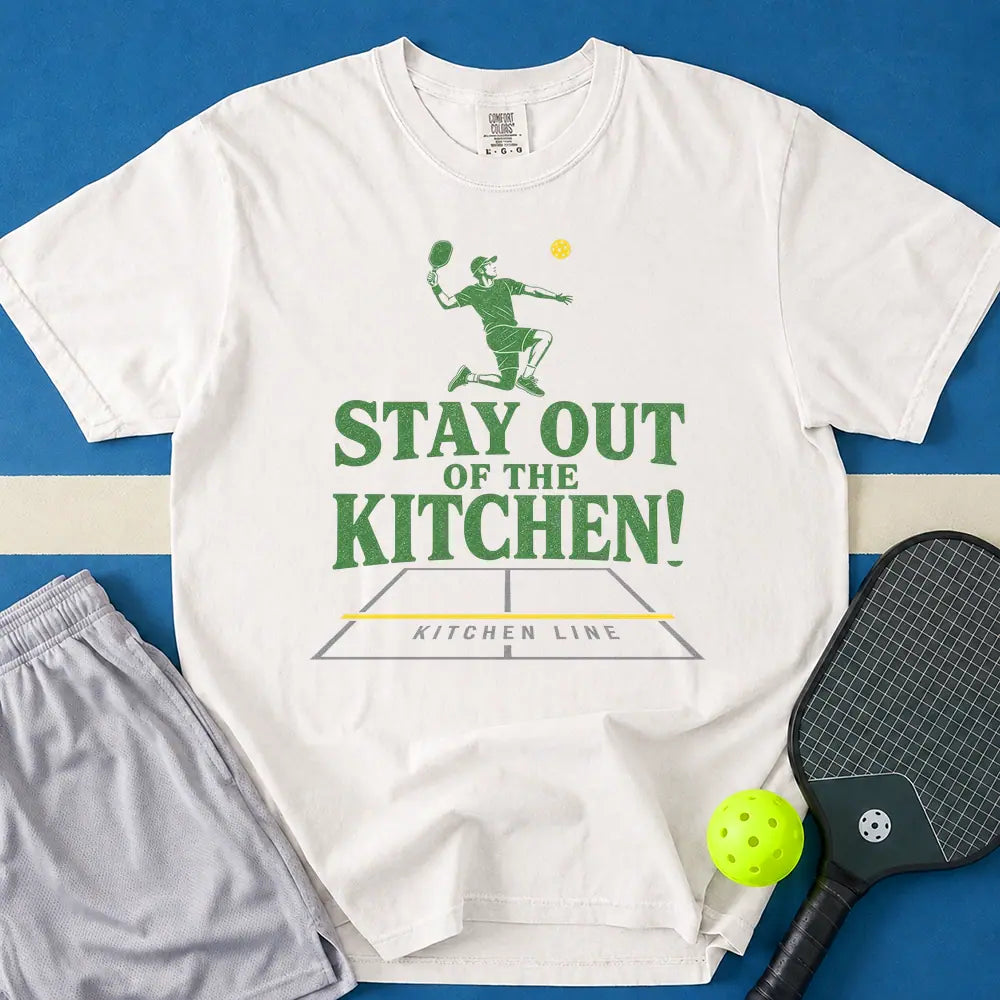 May include Stay Out Of The Kitchen Pickleball T-Shirt in white t-shirt with Stay Out Of The Kitchen Pickleball design