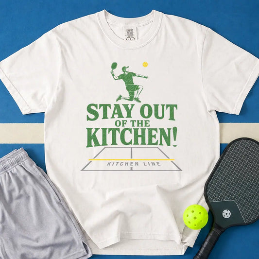 May include Stay Out Of The Kitchen Pickleball T-Shirt in white t-shirt with Stay Out Of The Kitchen Pickleball design