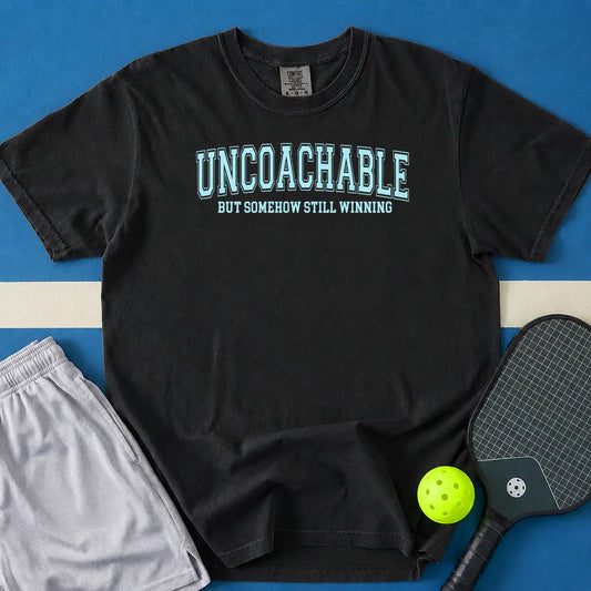 May include Uncoachable But Somehow Still Winning T-Shirt in black t-shirt with Uncoachable But Somehow Still Winning design