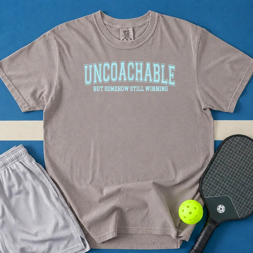 May include Uncoachable But Somehow Still Winning T-Shirt in gray t-shirt with Uncoachable But Somehow Still Winning design