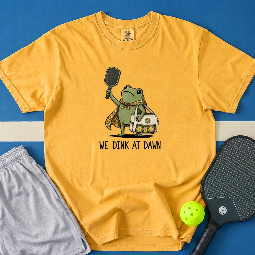 May include We Dink At Dawn T-Shirt in mustard t-shirt with We Dink At Dawn design