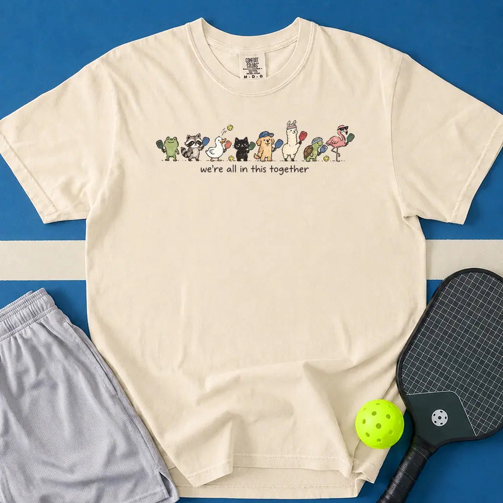May include We're All In This Together T-Shirt in ivory t-shirt with We're All In This Together design